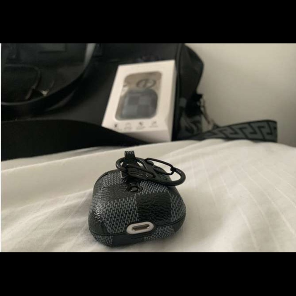 black and grey airpod cases